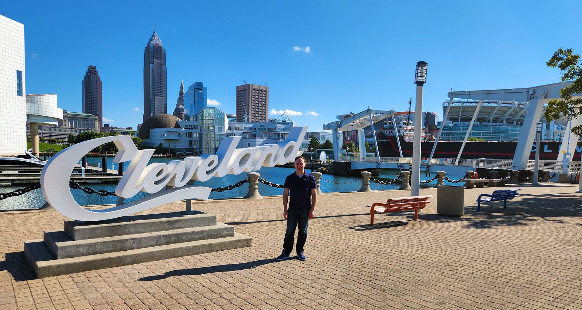 Michael at the Cleveland lakefront, where a day trip from Chicago and a closed transit route led to 6+ miles on foot through the city.